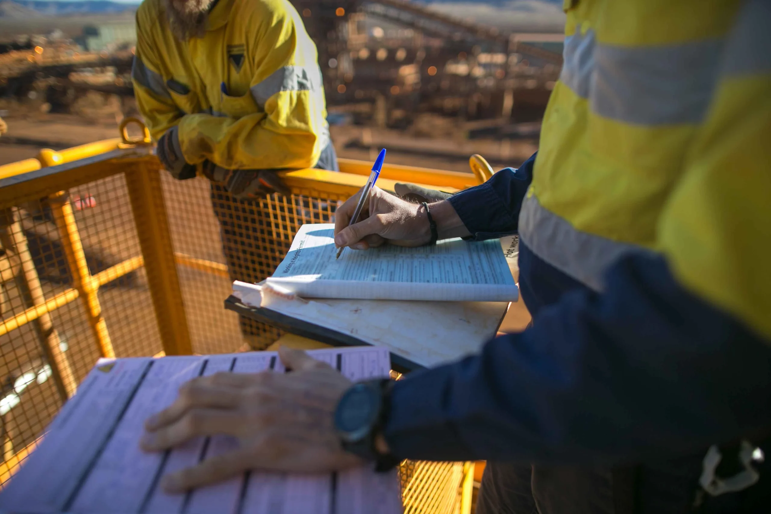 midsection-colleagues-construction-site_11zon